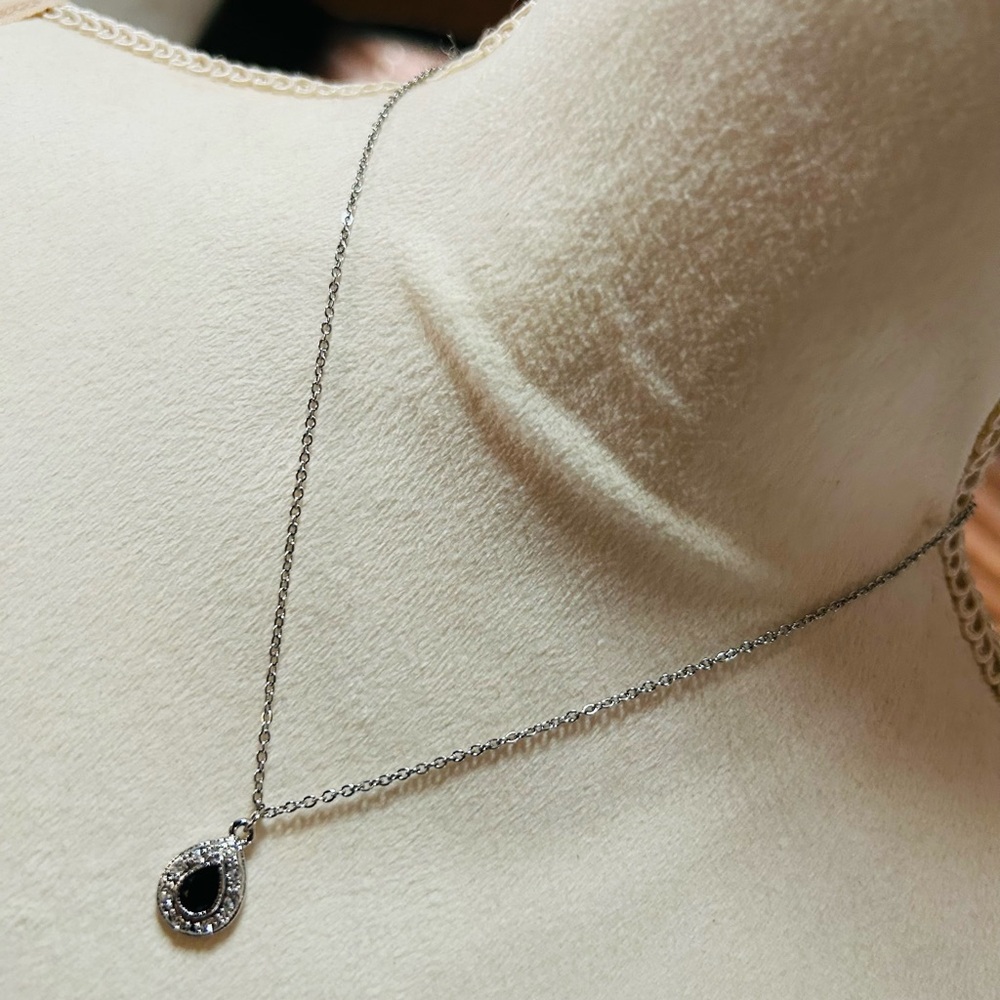 Elegant teardrop jet black halo pendant on chain necklace
